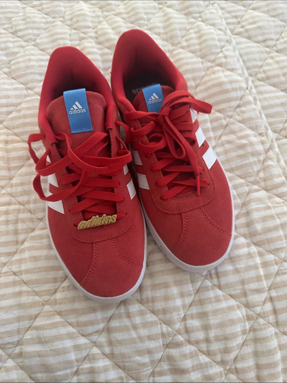 adidas Red Suede Sneakers with White Stripes and Blue Tongue Tag